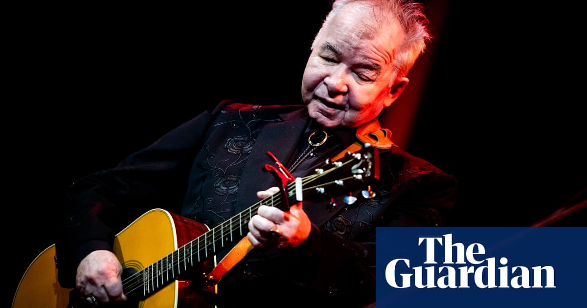 John Prine: singer-songwriter critically ill with Covid-19 symptoms, family says