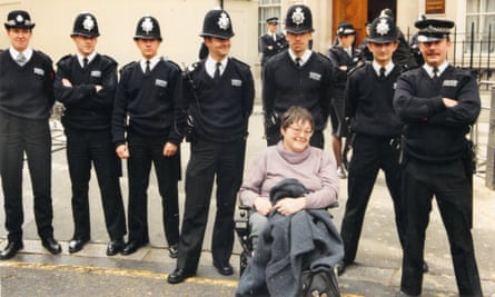 Lorraine Gradwell in a demonstration at Conservative Central Office in the 1990s, with a contingent of police officers.