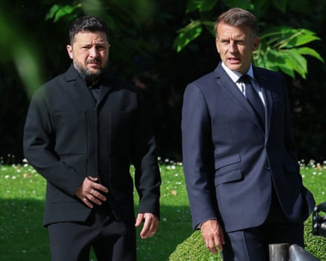 France’s President Emmanuel Macron greets Ukraine’s President Volodymyr Zelenskyy ahead of the working session with G7 leaders and Ukraine during the G7 summit, in Evian.