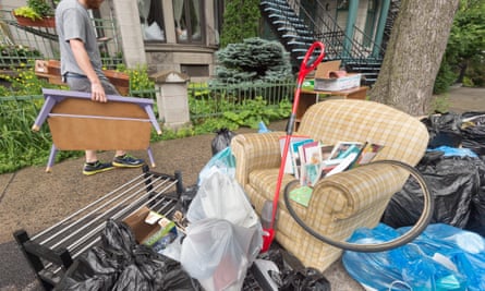 Belongings on the sidewalk on Moving Day, which takes place as Canadians outside of Quebec celebrate Canada Day. Some people think this is no coincidence.