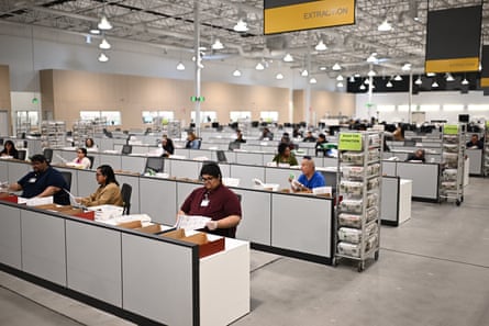 Ballots are inspected astatine nan LA County Ballot Processing Center during Tuesday’s election.