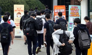 High school students arrive at a high school, amid the coronavirus pandemic, in Seoul, South Korea, 21 September 2020.