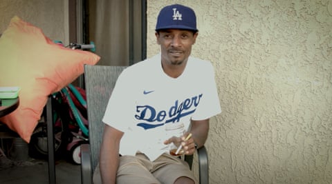 a man with a baseball cap