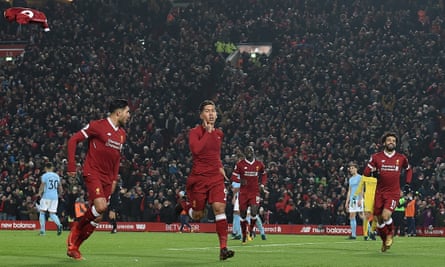 Roberto Firmino (centre) celebrates after scoring Liverpool’s second goal in January 2018.