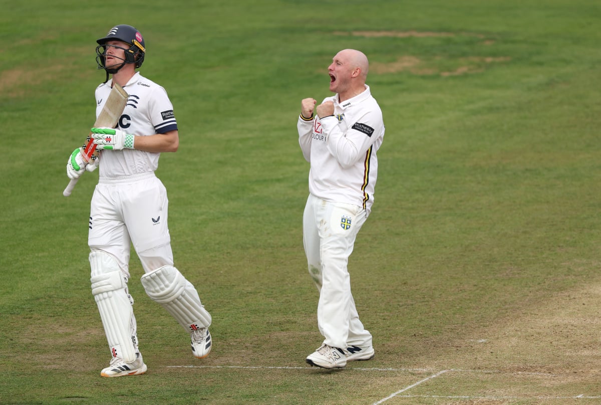 Callum Parkinson celebrates a wicket.