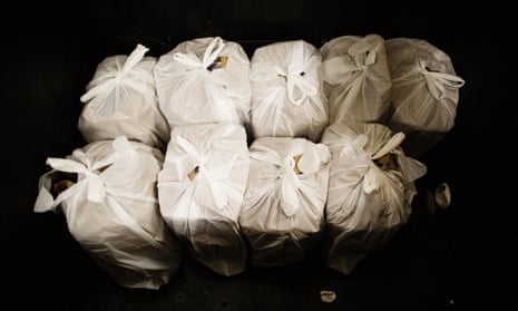 Bags of food ready for people who drop in a food bank in San Jose, California.