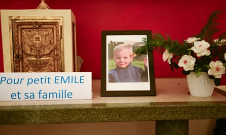 A card with the inscription reading ‘For little Emile and his family’ next to a portrait of Emile, a missing boy, who disappeared on 8 July 2023