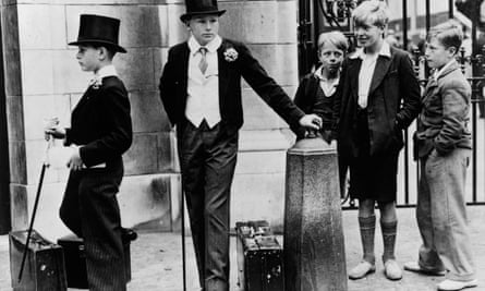 Boys in top hats watched by less well-off boys