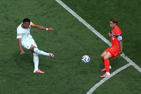 Kylian Mbappe manages to get his shot past Patrick Berg but it goes wide of the goal.