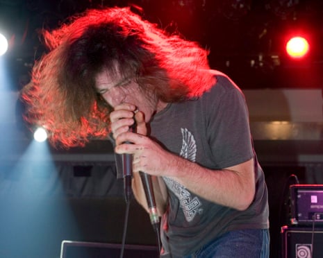 Wolf Eyes performing in 2006.