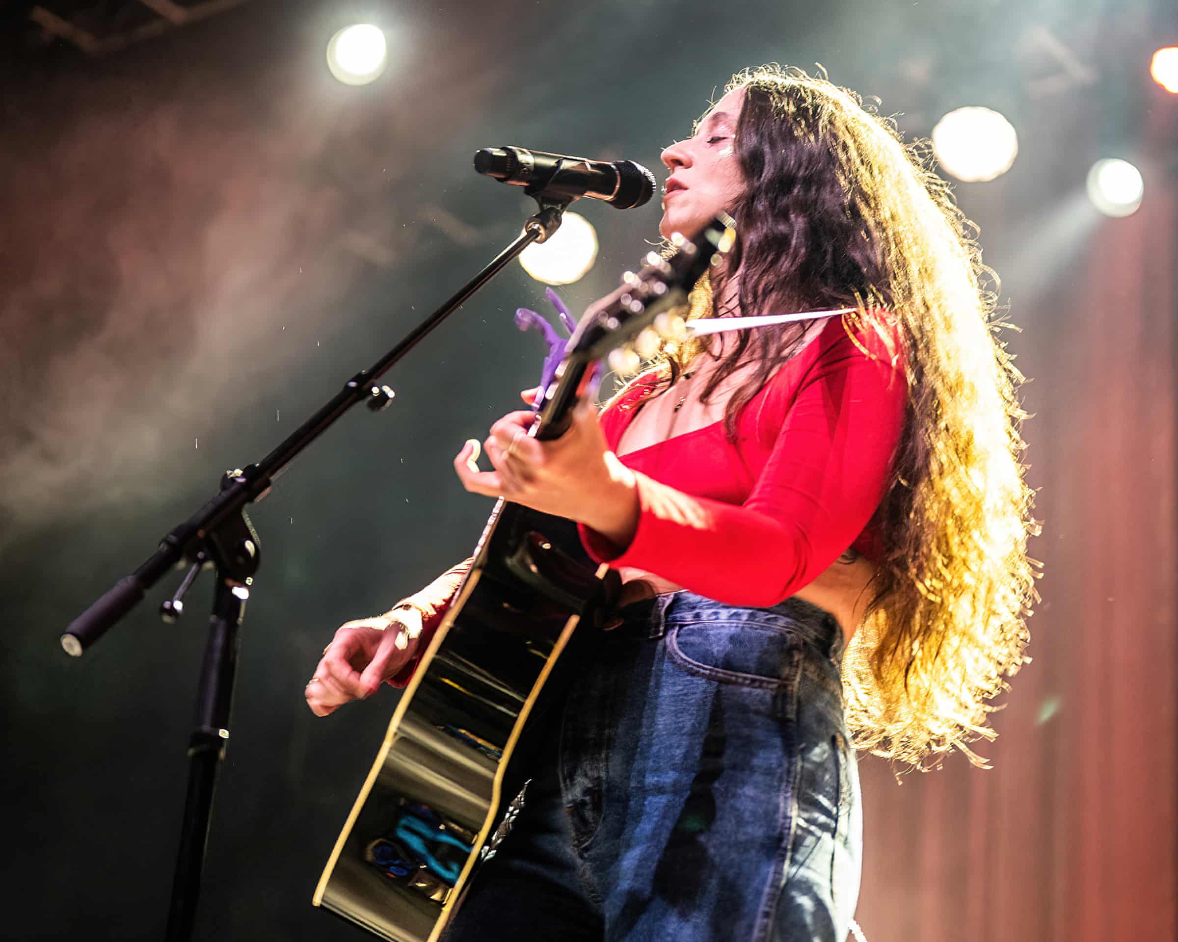 Waxahatchee performing at a London music venue