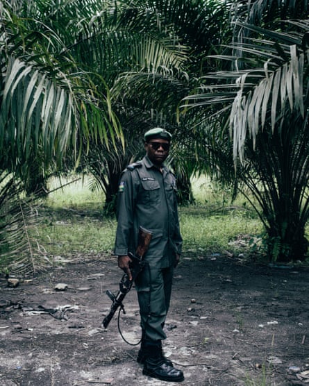 A local police man in Ughelli, Niger Delta, Nigeria.