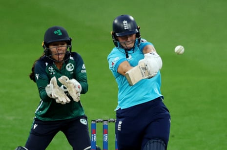 England's Alice Capsey smacks a delivery by Ireland's Louise Little for four to win the match.