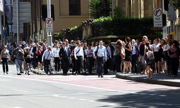 Office workers are evacuated during the Sydney siege.