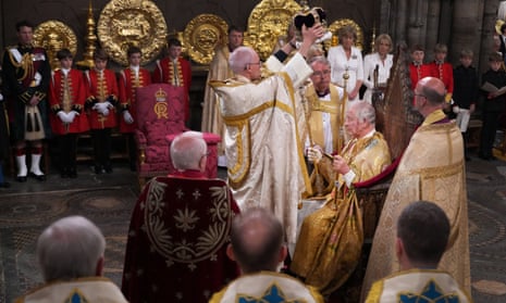 King Charles III is crowned with St Edward’s crown by the archbishop of Canterbury during his coronation ceremony in Westminster Abbey.