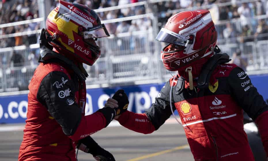 Charles Leclerc celebrates with Ferrari teammate Carlos Sainz after the pair locked out the front row in Miami.