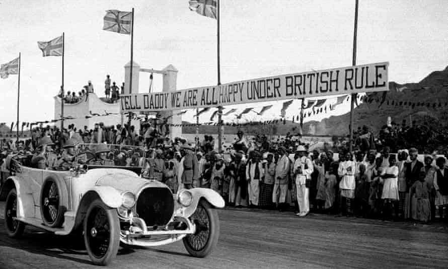 The Prince of Wales in Aden November 12, 1921, to visit troops passes locals and a banner asking him to “Tell Daddy we are all happy under British rule”. Daddy was King George V.