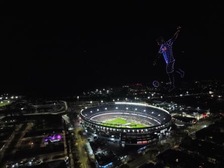 Drones create the shape of Lionel Messi above the Monumental Stadium in Buenos Aires.