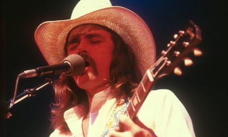 Dickey Betts performing with the Allman Brothers in New York in the late 1970s. He was a larger than life character with his cowboy hats, long moustache and gunslinger good looks.