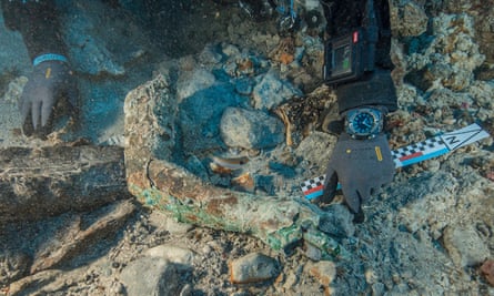 The bronze arm on the seafloor during the excavation.