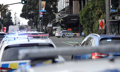 New Zealand police lock down Auckland streets after shooting – video
