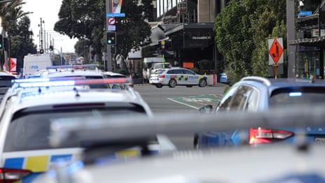 New Zealand police lock down Auckland streets after shooting – video