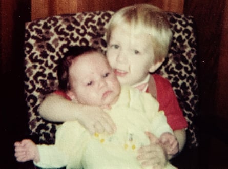 Rachel Dolezal as a baby, being held by Josh, her biological brother