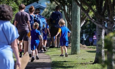Students are seen entering school grounds for their first day back of the year