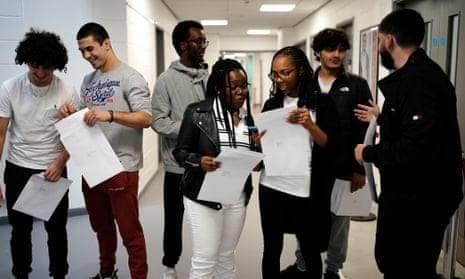 Students in London receive their A-level results. 