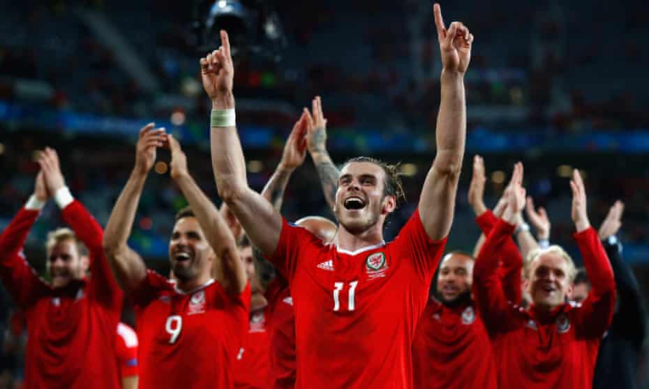 Gareth Bale (centre) and Wales celebrate their 3-1 quarter-final victory against Belgium at Euro 2016.