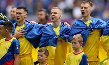 Oleksandr Zinchenko during the Ukrainian national anthem before his side’s group-stage match against Slovakia at the Euros