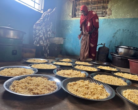 Women preparing food at the Mbera refugee camp in south-eastern Mauritania