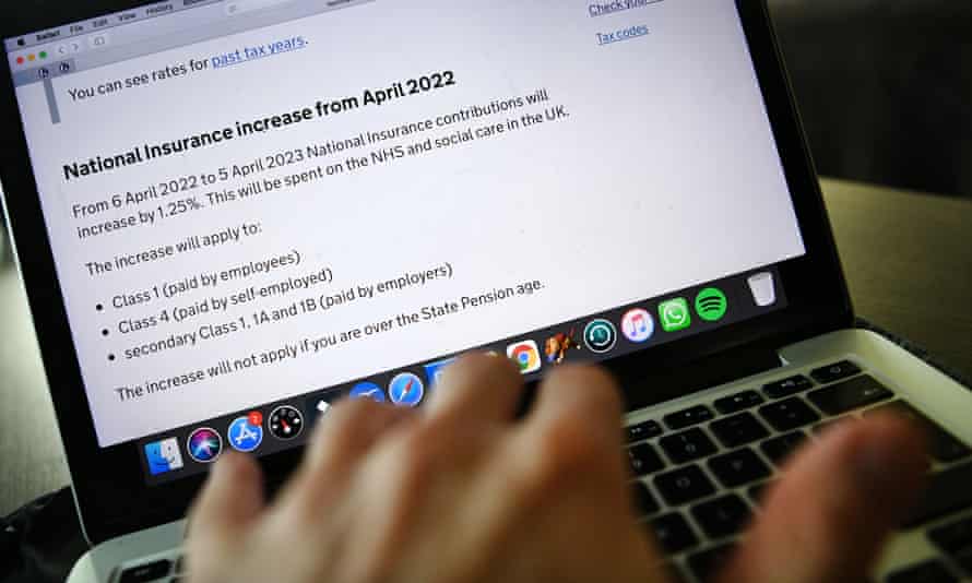 Someone looks at national insurance information on a laptop