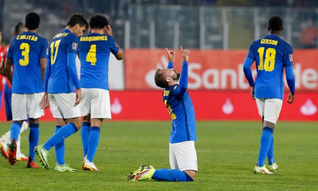 Everton Ribeiro on his knees in celebration after scoring Brazil’s winner in Chile.
