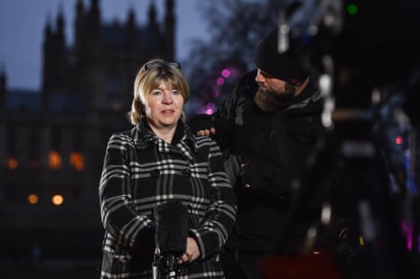 Maria Caulfield doing a TV interview outside the Houses of Parliament this morning.