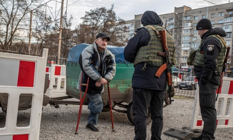 A man from occupied territories is checked by police in Zaporizhzhia.