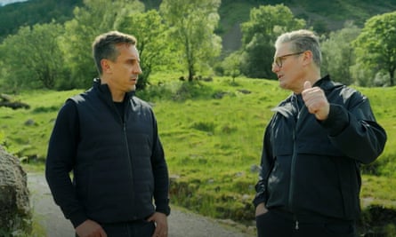 Keir Starmer and former Manchester United star Gary Neville take a walk in the Lake District for an election broadcast.