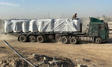 A truck carries aid for Palestinian people in Khan Younis, in the southern Gaza Strip.