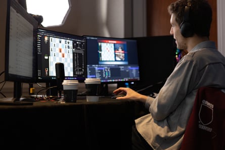 This undated photo released by Charlotte Chess Center shows Daniel Naroditsky playing chess at the computer.