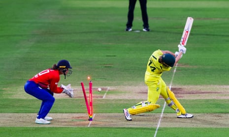Sophie Ecclestone of England bowls Annabel Sutherland of Australia.