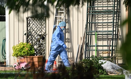 Police are seen at the scene of a murder investigation in Burpengary, Queensland.