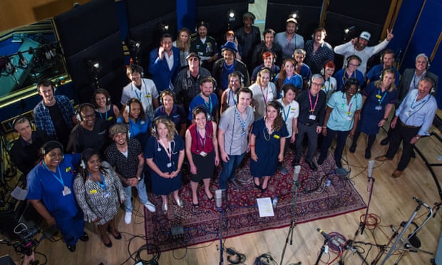 ‘We are doing it to boost morale’ … the choir and stars.