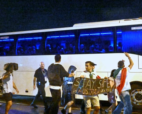 Supporters near a bus transporting the Iranian women’s football team in Queensland, Australia, on Sunday