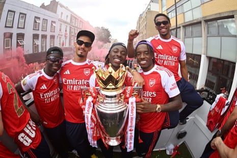 Bukayo Saka, William Saliba, Eberechi Eze, Noni Madueke and Jurrien Timber of Arsenal pose for a photo.