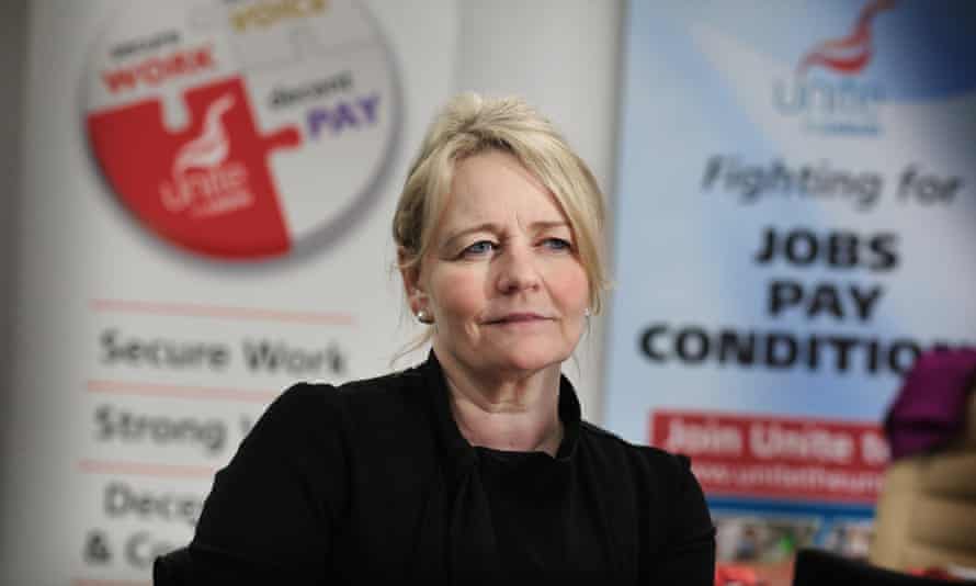 Portrait of Sharon Graham against a background of Unire campaign posters