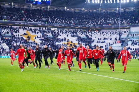 Monza players head off to celebrate their win with their fans.