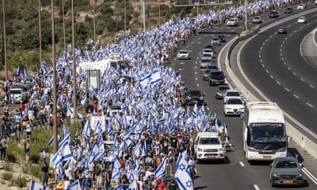 Israelis march from Tel Aviv to West Jerusalem to protest against Benjamin Netanyahu’s judicial reform plans on Saturday.