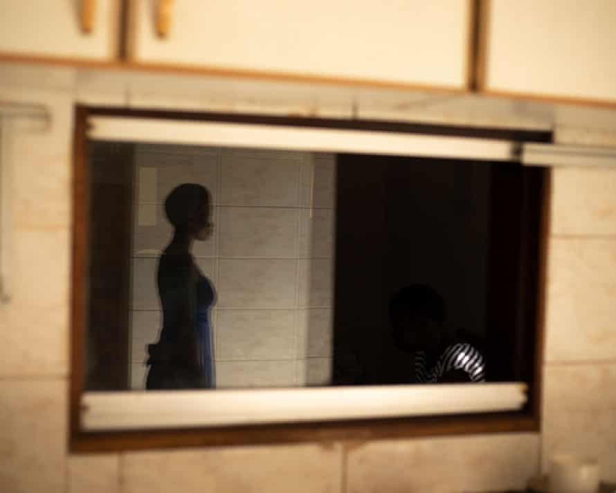 Silhouette seen in profile in mirror