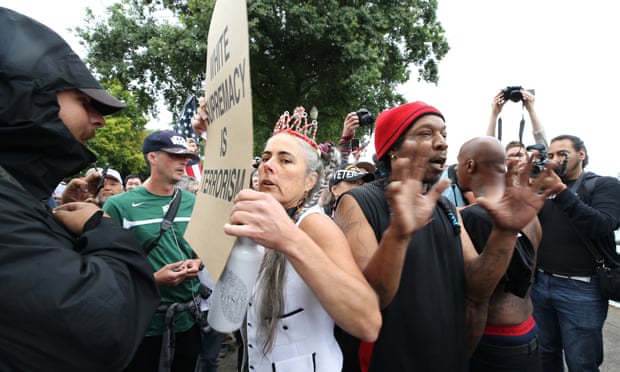 Counter-protesters debate with alt-right groups at Tom McCall Waterfront Park.