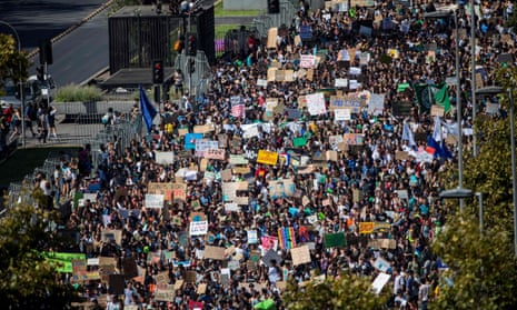 Thousands take part in a protest called by the “Fridays For Future” movement on a global day of student protests aiming to spark world leaders into action on climate change in Santiago, Chile, on March 15, 2019.
